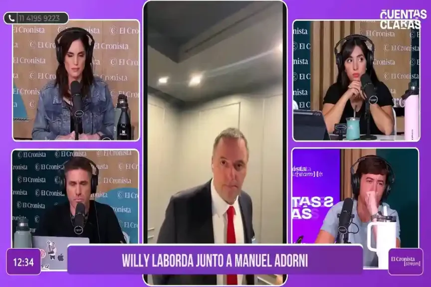 Manuel Adorni durante una entrevista defendiendo el viaje de su esposa